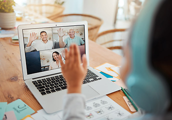 Image showing Video call, laptop and child greeting her family while sitting by the dining room table in her home. Technology, waving and girl kid on a virtual call with her parents and grandfather on a computer.