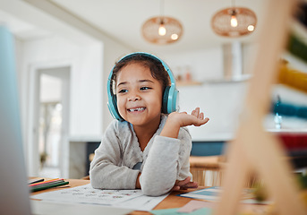 Image showing Video call, computer and child e learning, online class and home education, translation and listening on headphones. Happy kid or excited girl on laptop with audio streaming service or virtual school