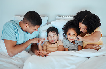 Image showing Top view, family and parents with children in bed for bonding, quality time and affection in morning. Happy, love and portrait of mother, father and kids in bedroom for fun, sleeping and relaxing