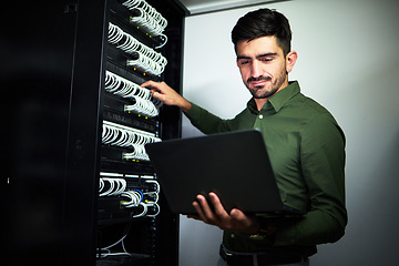 Image showing Laptop, engineering and man technician in a server room for technical repairs by a control box. Technology, maintenance and professional male electrician working on computer for cybersecurity system.