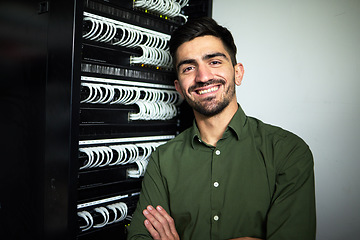 Image showing Engineer man, cables and portrait in a server room for network, maintenance and software upgrade. Young male technician person with a smile in data center for wire, hardware and internet connection