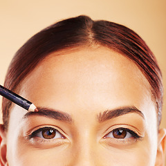 Image showing Makeup, eyebrow pencil and woman with cosmetic beauty application in portrait isolated in studio background. Closeup, facial or person with face for microblading aesthetic, glow or glamour product