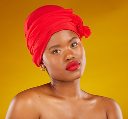 Image showing Natural beauty, hair wrap and portrait with scarf, red lipstick and wellness in studio. Yellow background, female person and face cosmetics with African model and makeup for skincare and facial glow