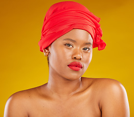 Image showing Beauty, red wrap and woman portrait with scarf for self care and wellness in studio. Yellow background, female person and face cosmetics with African model and makeup for skincare and facial glow