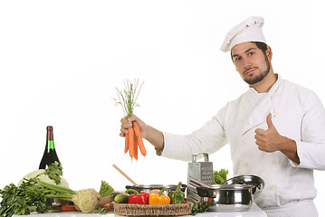 Image showing young chef preparing lunch 