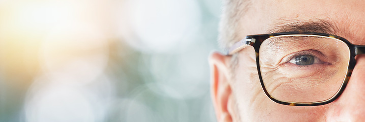 Image showing Portrait, mockup and a man in glasses for vision at the optometrist for prescription frame lenses. Eye, banner space and an optometry customer at the optician for a healthcare appointment on bokeh