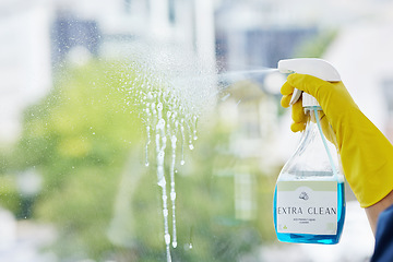 Image showing Hands, cleaning spray and bottle at windows for hygiene of bacteria, dust and germs. Closeup, housekeeping and cleaner with chemical liquid product for dirt, glass surface and hospitality services