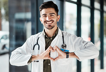 Image showing Happy portrait man, doctor and heart hands for healthcare love, medical service trust and hospital support. Cardiology, emoji health icon and male surgeon for wellness, clinic help or life insurance