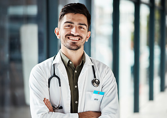 Image showing Portrait, arms crossed and confident doctor, happy man or surgeon smile for healthcare, medical service and hospital support. Cardiology expert, professional and cardiologist pride in wellness clinic