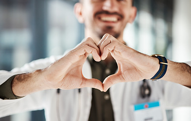 Image showing Hospital doctor, happy man and closeup heart hands for surgeon healthcare, medical services and cardiology health. Medicine satisfaction, emoji love icon and clinic person with nursing wellness care