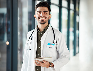 Image showing Portrait, tablet and confident doctor, happy man or surgeon smile for research, medicare insurance and clinic support. Cardiology expert, professional person and healthcare worker for online report