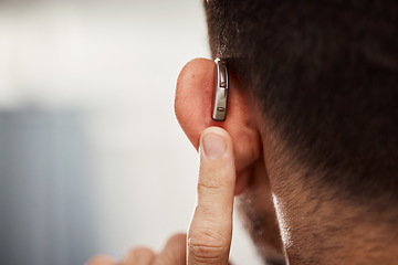 Image showing Closeup of ear, hearing aid and man with disability from the back for support, improve listening or amplifier with mockup space. Deaf patient, face and audiology implant to help volume of sound waves