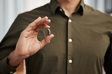 Image showing Hearing aid, business man with disability and hands show communication implant for support, listening and medical innovation. Closeup of deaf person with audiology tech to help volume of sound waves