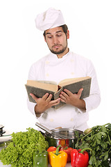 Image showing young chef preparing lunch 