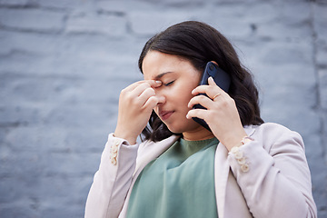 Image showing Headache, phone call and business woman in city with bad news and stress from work. Burnout, urban and female professional frustrated from job fail with anxiety and mobile networking in conversation