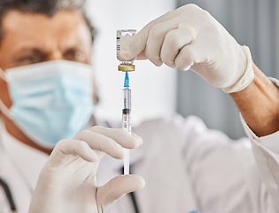 Image showing Healthcare, vaccine and closeup of a doctor with a needle for a flu, cold or allergy treatment. Professional, injection vial and zoom of male medical worker with a vaccination syringe in a clinic.