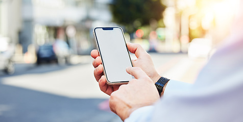 Image showing Phone, mockup and hands in a city for travel with space for advertising, contact or information. Smartphone, screen and person online for location, directions or guide, app or navigation in a street