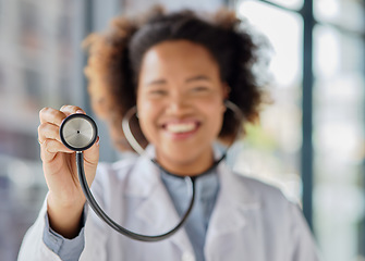 Image showing Doctor, hands and woman listening with stethoscope for heartbeat, healthcare services or cardiology. Closeup of female medical worker with tools to check heart, lungs and breathing test in hospital