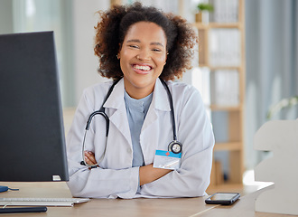 Image showing Black woman, portrait and doctor at desk in hospital for medical services, advice and consultation. Medicine, healthcare and happy young female therapist confident in consulting with trust in clinic