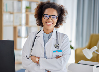 Image showing Black woman, portrait and medical doctor with arms crossed for consultation, hospital support and help. Happy confident female therapist ready for professional healthcare, clinic consulting and trust