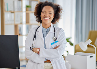Image showing Black woman, portrait and doctor with arms crossed in hospital for medical services, advice and wellness consulting. Medicine, healthcare and happy young female therapist working with trust in clinic