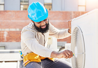 Image showing Man, technician or repair for air conditioner on rooftop in city for box or industrial labor outdoors. Maintenance, engineer or contractor fixing hcav on roof for installation or machine inspection