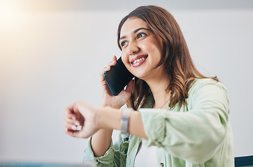 Image showing Phone call, watch and woman checking the time in the office while talking on a cellphone. Happy, smile and young female person on a mobile conversation with technology for a schedule in the workplace