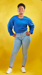 Image showing Happy, fashion and portrait of a black woman on a studio background for style and trendy aesthetic. Smile, beautiful and a young African girl or model in clothes isolated on a yellow backdrop