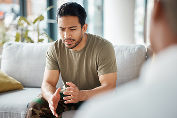 Image showing PTSD, soldier and man in therapy for trauma counseling due to military war and talking army mental health support. Consultation, depression and sad man with help for psychology problem on a sofa