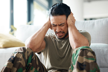 Image showing Soldier, man and stress, headache or PTSD of military trauma, remember pain and fear or scared on floor. Sad, frustrated and mental health of army or veteran person with depression or anxiety at home