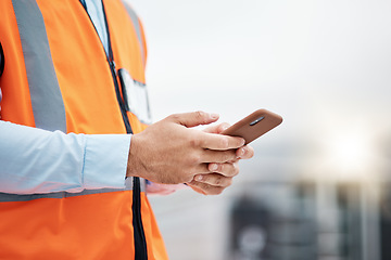 Image showing Phone, architecture and hands of man in city for engineering, construction site and communication. Building, social media and mobile app with closeup of contractor for contact, networking and mockup