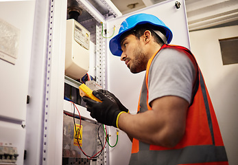 Image showing Electrician, engineering and inspection with man in control room for multimeter, mechanic and safety. Electricity, energy and power with technician and check for generator, maintenance and circuit