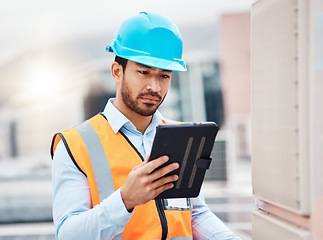 Image showing Tablet, engineering and man with air conditioner on roof for repair, maintenance and inspection. Solar power, construction and male worker on digital tech online for service, check and electricity