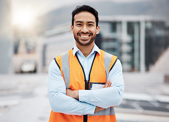 Image showing Portrait, construction worker and man smile with arms crossed with solar panel job outdoor. Roof, eco engineer and green energy project with builder and sustainability contractor ready for work