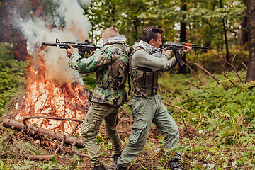 Image showing Angry terrorist militant guerrilla soldier warrior in forest