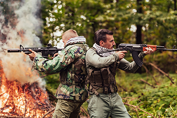 Image showing Angry terrorist militant guerrilla soldier warrior in forest