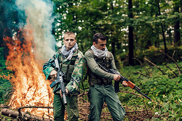 Image showing Angry terrorist militant guerrilla soldier warrior in forest