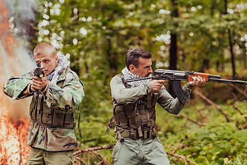 Image showing Angry terrorist militant guerrilla soldier warrior in forest