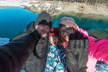 Image showing Family selfie at winter journey.