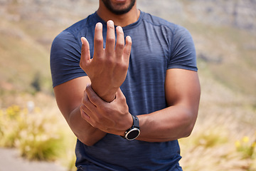 Image showing Sports runner, hand or wrist pain from fitness training injury or running workout accident outdoor. Healthy person, forearm muscle or closeup of injured male athlete with exercise emergency in nature