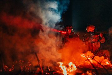 Image showing Soldiers squad in action on night mission using laser sight beam lights military team concept