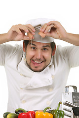 Image showing funny chef cracking an egg