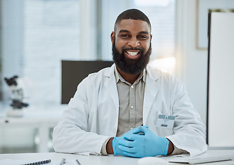 Image showing Black man, portrait and scientist smile in lab for future innovation, medical research and physics investigation. Happy male laboratory worker, science expert and pharmaceutical development at desk