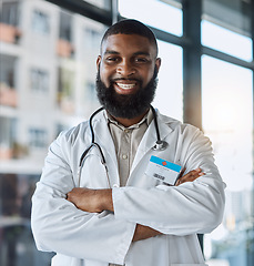 Image showing Doctor, portrait and man with arms crossed for healthcare service, clinic and hospital management or support and leadership. Happy face of medical african person for professional health and proud job