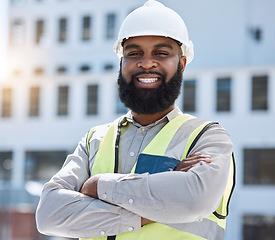 Image showing Construction, portrait or man with arms crossed in city for building project, site maintenance or civil engineering. Architecture, happy African professional contractor for urban property development