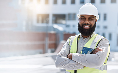 Image showing Man, engineering portrait and arms crossed at city construction site, solar panels and rooftop design technician. Happy face of african person, architecture, worker or contractor in outdoor mockup