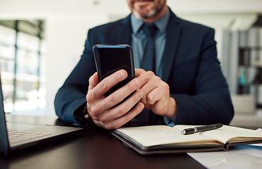 Image showing Hands, phone and notebook with a business man checking his calendar while planning in an office. Mobile, communication or test message with an employee reading a schedule at his desk in the workplace