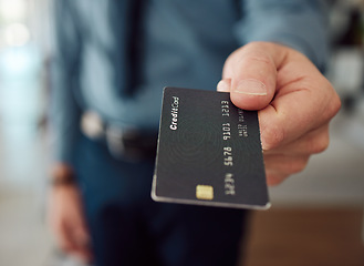 Image showing Business man giving credit card with hands for finance, accounting budget and banking investment. Closeup of worker offer payment for online shopping, fintech and trading money in financial economy