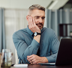 Image showing Confused, bored and business man at laptop in office with stress, fatigue and problem. Computer, tired and mature manager with doubt, financial crisis and reading debt email, tax audit and burnout