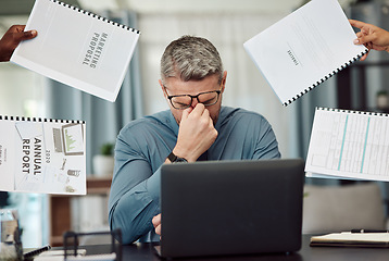 Image showing Business man, stress and overwhelmed with headache, documents and staff hands in busy office. CEO, manager or tired boss with laptop, paperwork and burnout with employee group at marketing agency